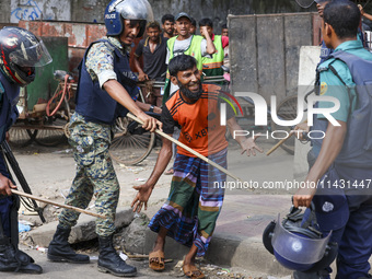 Students are clashing with police during a protest over a controversial quota system for government job applicants in Dhaka, Bangladesh, on...