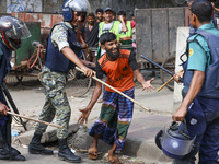 Students are clashing with police during a protest over a controversial quota system for government job applicants in Dhaka, Bangladesh, on...