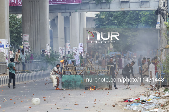 Students are clashing with police during a protest over a controversial quota system for government job applicants in Dhaka, Bangladesh, on...