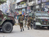 Bangladeshi military force soldiers are patrolling a street during a nationwide curfew in Dhaka, Bangladesh, on July 20, 2024. (