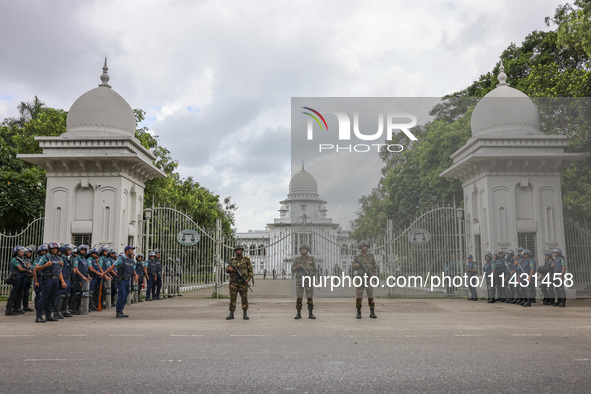 Bangladeshi military forces are patrolling on armored vehicles on the streets of Dhaka, Bangladesh, on July 21, 2024. 