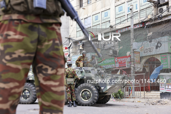 Bangladeshi military forces are patrolling on armored vehicles on the streets of Dhaka, Bangladesh, on July 21, 2024. 