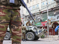 Bangladeshi military forces are patrolling on armored vehicles on the streets of Dhaka, Bangladesh, on July 21, 2024. (