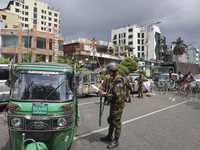 Bangladeshi military forces are patrolling on armored vehicles on the streets of Dhaka, Bangladesh, on July 21, 2024. (