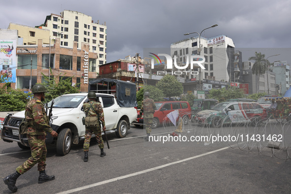 Bangladeshi military forces are patrolling on armored vehicles on the streets of Dhaka, Bangladesh, on July 21, 2024. 