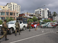 Bangladeshi military forces are patrolling on armored vehicles on the streets of Dhaka, Bangladesh, on July 21, 2024. (