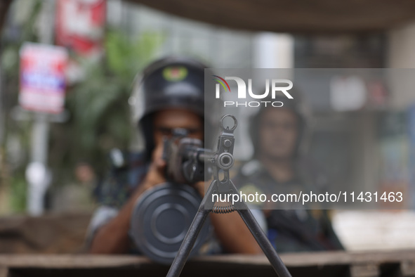 Bangladeshi military forces are patrolling on armored vehicles on the streets of Dhaka, Bangladesh, on July 21, 2024. 