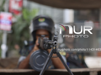 Bangladeshi military forces are patrolling on armored vehicles on the streets of Dhaka, Bangladesh, on July 21, 2024. (