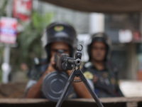 Bangladeshi military forces are patrolling on armored vehicles on the streets of Dhaka, Bangladesh, on July 21, 2024. (