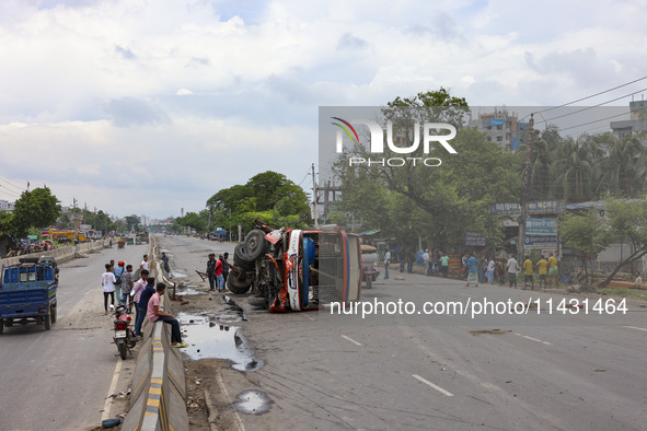 Bangladeshi military forces are patrolling on armored vehicles on the streets of Dhaka, Bangladesh, on July 22, 2024. 