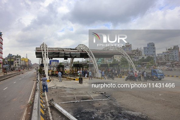 The burnt building of the Bangladesh Bridge Authority is being pictured after students set it on fire amid the ongoing anti-quota protest in...