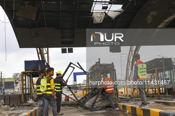 The burnt building of the Bangladesh Bridge Authority is being pictured after students set it on fire amid the ongoing anti-quota protest in...