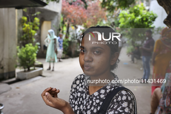 A relative of a protester is waiting for a dead body in Dhaka, Bangladesh, on July 22, 2024. 