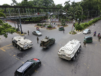 Bangladeshi military forces are patrolling on armored vehicles on the streets of Dhaka, Bangladesh, on July 22, 2024. (