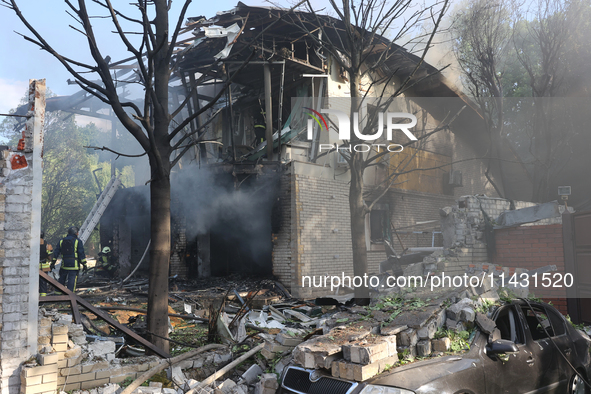 A damaged building is being seen in a residential area hit by a Russian guided bomb in central Kharkiv, Ukraine, on July 24, 2024. NO USE RU...