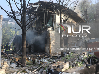 A damaged building is being seen in a residential area hit by a Russian guided bomb in central Kharkiv, Ukraine, on July 24, 2024. NO USE RU...