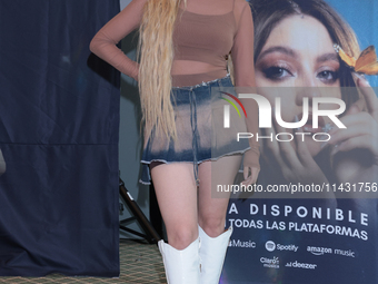 Mexican singer Karol Sevilla is posing during a press conference for the 'Luminova Tour' to promote her single ''Cenicienta'' at Belair Uniq...