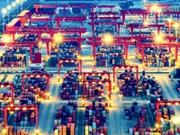 The container terminal of Taicang Port Phase 4 is being illuminated in Suzhou, Jiangsu province, China, on the evening of July 9, 2024. (