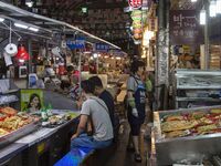 A general view is showing the South Korean traditional food court at Gwangjang Market in Seoul, South Korea. Gwangjang Market is being a tra...