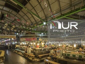 A general view is showing the South Korean traditional food court at Gwangjang Market in Seoul, South Korea. Gwangjang Market is being a tra...