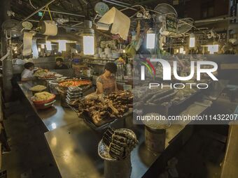 A general view is showing the South Korean traditional food court at Gwangjang Market in Seoul, South Korea. Gwangjang Market is being a tra...