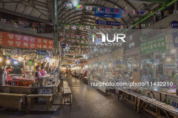 A general view is showing the South Korean traditional food court at Gwangjang Market in Seoul, South Korea. Gwangjang Market is being a tra...