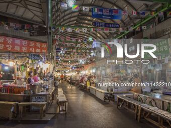 A general view is showing the South Korean traditional food court at Gwangjang Market in Seoul, South Korea. Gwangjang Market is being a tra...