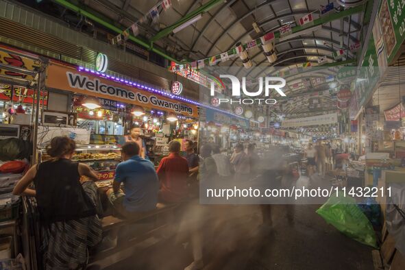 A general view is showing the South Korean traditional food court at Gwangjang Market in Seoul, South Korea. Gwangjang Market is being a tra...