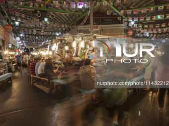 A general view is showing the South Korean traditional food court at Gwangjang Market in Seoul, South Korea. Gwangjang Market is being a tra...