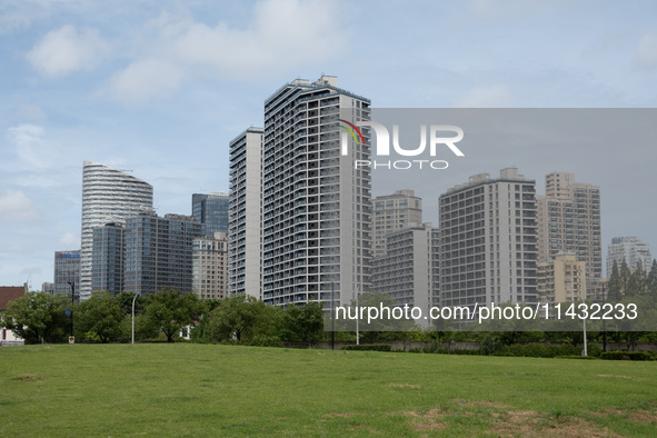 Residential buildings are being seen near the Huangpu district in Shanghai, China, on July 25, 2024. 