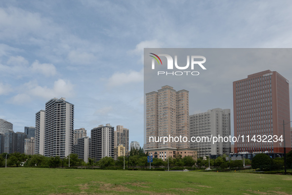 Residential buildings are being seen near the Huangpu district in Shanghai, China, on July 25, 2024. 