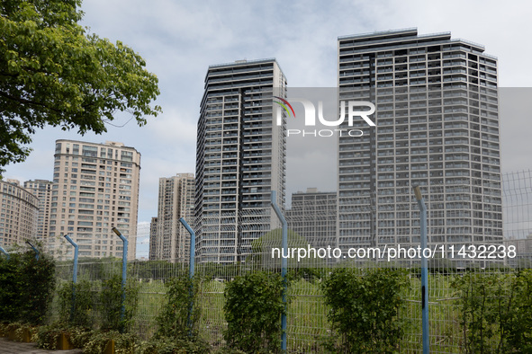 Residential buildings are being seen near the Huangpu district in Shanghai, China, on July 25, 2024. 