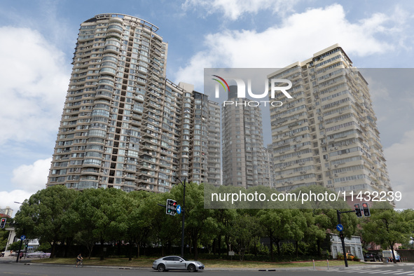 Residential buildings are being seen near the Huangpu district in Shanghai, China, on July 25, 2024. 