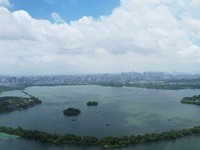 Winds and clouds are rising above the West Lake affected by Typhoon Kaemi in Hangzhou, China, on July 25, 2024. (