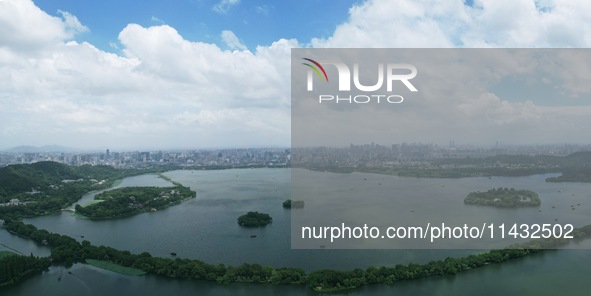 Winds and clouds are rising above the West Lake affected by Typhoon Kaemi in Hangzhou, China, on July 25, 2024. 