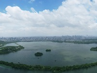 Winds and clouds are rising above the West Lake affected by Typhoon Kaemi in Hangzhou, China, on July 25, 2024. (