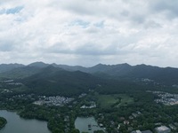 Winds and clouds are rising above the West Lake affected by Typhoon Kaemi in Hangzhou, China, on July 25, 2024. (