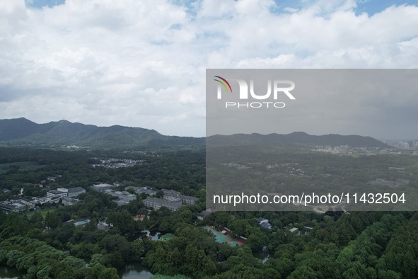 Winds and clouds are rising above the West Lake affected by Typhoon Kaemi in Hangzhou, China, on July 25, 2024. 