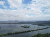 Winds and clouds are rising above the West Lake affected by Typhoon Kaemi in Hangzhou, China, on July 25, 2024. (