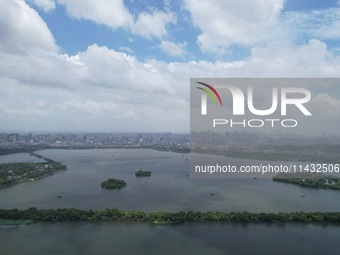 Winds and clouds are rising above the West Lake affected by Typhoon Kaemi in Hangzhou, China, on July 25, 2024. (