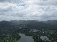 Winds and clouds are rising above the West Lake affected by Typhoon Kaemi in Hangzhou, China, on July 25, 2024. (