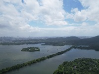 Winds and clouds are rising above the West Lake affected by Typhoon Kaemi in Hangzhou, China, on July 25, 2024. (