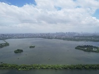 Winds and clouds are rising above the West Lake affected by Typhoon Kaemi in Hangzhou, China, on July 25, 2024. (