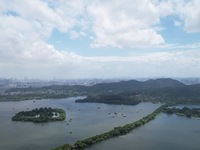 Winds and clouds are rising above the West Lake affected by Typhoon Kaemi in Hangzhou, China, on July 25, 2024. (