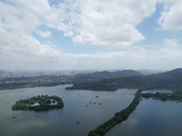 Winds and clouds are rising above the West Lake affected by Typhoon Kaemi in Hangzhou, China, on July 25, 2024. (