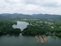 Winds and clouds are rising above the West Lake affected by Typhoon Kaemi in Hangzhou, China, on July 25, 2024. (