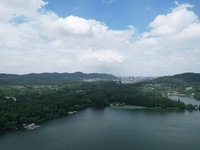 Winds and clouds are rising above the West Lake affected by Typhoon Kaemi in Hangzhou, China, on July 25, 2024. (