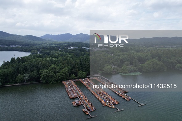 Winds and clouds are rising above the West Lake affected by Typhoon Kaemi in Hangzhou, China, on July 25, 2024. 