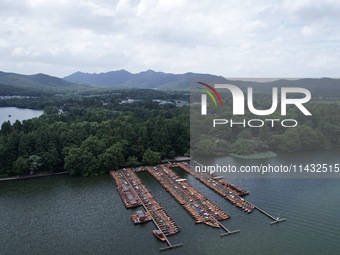 Winds and clouds are rising above the West Lake affected by Typhoon Kaemi in Hangzhou, China, on July 25, 2024. (