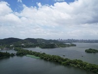 Winds and clouds are rising above the West Lake affected by Typhoon Kaemi in Hangzhou, China, on July 25, 2024. (